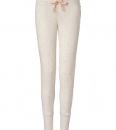 More chic than your average thermal, these neutral lounge pants from Juicy Couture will stylishly enliven your casual at-home style - Elasticized waist with bow drawstring, slim fit, large cuffs at hem - Wear with a matching camisole, fuzzy slippers, and a cozy robe