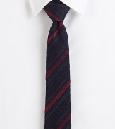 A multi-textured weave with ribbon stripes of color on pure Italian silk.SilkDry cleanMade in Italy