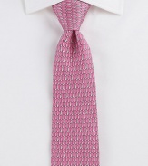 An artistic, colorful pattern is handsomely woven in fine Italian silk.SilkDry cleanMade in Italy