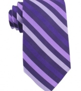 Go bold. This silk striped tie from Michael Kors makes an instant style statement in your wardrobe.