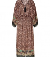 Elegant caftan of fine, patterned synthetic fiber - Glamorous leopard print and black border hem - Super soft and breezy, feels luxurious on the skin - Loose case, with waist accent and decorative drapery - Cropped sleeve length - Great for the beach or beach club over a bikini and with strappy sandals or leather thongs