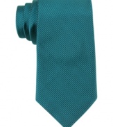 Give your basic dress wear a pop of teal with this cool skinny tie from Calvin Klein.