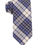 Be a plaid man in this cool madras tie from Tommy Hilfiger. Skinny construction gives it the most modern edge.