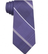 Simple and subtle. Pair this striped DKNY tie with a crisp shirt from your closet for instant sophistication.