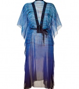 Luxurious caftan of a fine, blue patterned cotton-silk blend - Glamorous and elegant in a slightly transparent style - Features feminine, embroidered V-neckline, batwing sleeves, and flattering waist belt - Fashionable for the beach, at parties or events, with a bikini and thongs, or with flowing pants, tank, and sexy heels