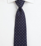 A fine silk tie featuring classic pointelle and the signature omega print.SilkDry cleanMade in Italy