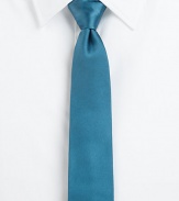 Modern elegance expertly crafted in smooth Italian silk.About 3 wideSilkDry cleanMade in Italy