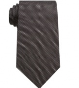 A neat pattern gives this silk tie from Perry Ellis subtle sophistication and texture.