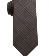 In a cool, muted plaid, this Bar III skinny tie proves style doesn't have to shout to be heard.