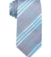 An energetic color palette lets this plaid tie from Ben Sherman wake up a charcoal gray world.