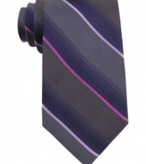 In a traditional stripe pattern, this Calvin Klein tie recalls classic haberdashery style.