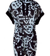 Stylish caftan in fine, pale blue and black cotton - Elegant, oversize graphic grape vine print - Lightweight and fluid, hits above the knee - Contrast trim at deep V-neck - Oversize, elbow-length sleeves - Cinched waist with skinny tie - A dream go-to for your next beach getaway - Also works layered over leggings and skinny denim with sandals