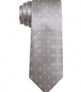 A subtle pattern and skinny construction give this Bar III tie modern edge.