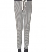 Super soft in ultra comfortable lightweight jersey, Juicy Coutures striped leggings are perfect for cozy lounging - Tonal grosgrain tie, charcoal waistband and fitted cuffs - Fitted, tapered leg - Wear with an oversized sweatshirt and shearling lined boots