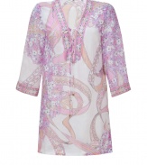 Blossom into warm weather chic in Emilio Puccis whimsical floral print cotton-silk tunic - Laced V-neckline, 3/4 sleeves, contrast print trim - Loosely fitted - Wear over swimwear with bright sandals and a straw tote, or layer over tissue tanks with slim trousers and heels