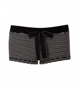 Lazy lounging calls for Juicy Coutures striped thermal shorts, perfect for showing off your assets in cozy-chic style - Elasticized drawstring waistline, decorative gold-toned buttoned fly detail - Extra short, form-fitting - Team with the matching top and shearling lined slippers