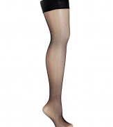 Detailed in fine black fishnet, Fogals seamless thigh-high stockings are a chic way to add a seductive edge to your outfit - Chic stretch stay-up border, seamless, invisible heel and toe - Perfect for wearing with pencil skirts or flirty cocktail dresses