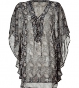 Bring instant breezy chic to your warm weather look with this tunic top from Melissa Odabash - Tie-detailed V-neck, dolman sleeves, all-over python print, semi-sheer - Wear with high-waisted skinnies, espadrille wedges, and a floppy hat