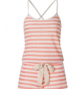 Light-hearted jumpsuit in fine poly-cotton blend is a sweet mix of casual and sexy - Features summer peach and white stripes - Narrow top with love cut back and cross straps - Short-shorts with drawstring waist and pockets - Wear with simple thong sandals at the beach, around town or on vacation