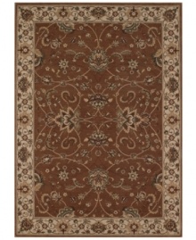 Evoking the strong look of ancient Sarouk rug designs, the Premier area rug from Dalyn is woven with intricate floral medallions in rich chocolate. Made in Egypt of durable polypropylene and shimmering polyester fibers, it provides any room with captivating texture and added dimension.