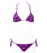 Stylish bikini in fine, synthetic fiber blend - Especially comfortable and flattering, thanks to a generous amount of stretch - Vibrant purple and pink leopard print - Triangular halter top with double straps and adjustable cups ties at back and nape of neck - Decorative criss cross design and gold snake ring - String brief ties at hips, offers modest coverage at rear - Sexy and fun, a must for you next vacation or beach getaway - Wear solo or layer beneath a caftan and pair with wedge sandals