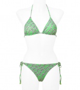 Add instant chic to your swim-ready style with this adorable bikini from Diane von Furstenberg - Classic triangle top with back dual tie closure, bottoms with side tie detail, all-over floral print - Pair with a sheer caftan, wedge heels, and a floppy sun hat