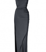 Super flattering and equally exquisite, Donna Karans modern draped evening gown guarantees a glamorous feminine finish to your contemporary evening look - Draped neckline, draped short sleeve, double layered strap detail, contoured gathered back seam, asymmetrical cut, deep side slit - Floor-length, form-fitting silhouette - Wear with shimmering fine jewelry and statement accessories