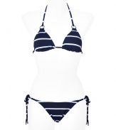 Stylish bikini in fine, synthetic fiber blend - Elegant and on-trend navy and white stripe motif, silver ring hardware - Especially comfortable and flattering, thanks to a generous touch of stretch - Triangular halter top with adjustable cups ties at back and nape of neck - String brief ties at hips, offers modest coverage at rear - Sexy and sophisticated, a must for you next vacation or beach getaway - Wear solo or layer beneath a caftan and wedge sandals