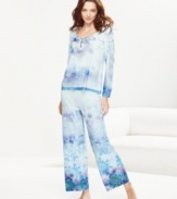 Embrace the lovely decorations of winter while staying warm and cozy in One World's Frozen Snowfall pajamas.