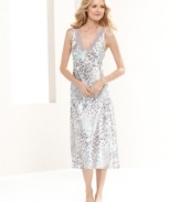 Lovely prints add a sense of energized texture to Jones New York's printed satin gown.