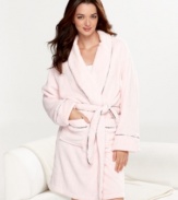 Treat yourself to the luxury of a hotel robe at home. Tommy Hilfiger designed this short robe in a super soft plush knit and added plaid for the signature style you love.