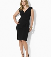 Fluid matte jersey drapes beautifully in a slinky, ruched silhouette featuring a chic, crossover neckline.