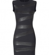 Luxe dress in a fine black leather-viscose blend - the dress lays close to your body and makes a racy silhouette - nevertheless, its very comfortable - sharp bandage look - slim top with high round neck and shoulder pads - sleeveless - skirt is straight and slim, mini-length - knock-out sexy, knock-out glam, a dress for women with self-confidence - wear with sandals, gladiator booties, peep toes