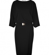 Detailed with a turnlock belt and modern cut dolman sleeves, Emilio Puccis draped sheath is a contemporary take on the Little Black Dress - Round neckline, 3/4 dolman sleeves, wrapped skirt, open back with self-tie closure at nape - Loosely fitted top, fitted skirt - Wear with heels and a dusting of fine jewelry