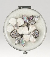 Jay Strongwater brings back old Hollywood glamour with this charming mirrored compact embellished with hand enameling and hand-set Swarovski crystals.Enamel and crystalSilvertoneHandmade, hand-enameled and hand-set2 diameterImported