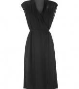 Luxe dress in black silk - material has an elegant, airy quality - narrowly draped look with feminine V-neck decollete and figure enhancing belted waist - sleeveless - pleasant knee-length skirt - simply a dream of a dress, sophisticated, impressive and sensationally elegant - timesless style that will never go out of date, but it and wear it forever - wear it exclusively with sandals, peep toes or platform pumps