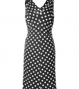 Stylish dress in a fine, black and white rayon-cotton blend - Fashionable polka dots - The dress is feminine, slim fit, falls soft, comfortable and flatters the figure - With a deep V-neckline, sleeveless - Pleasant mid-thigh length - Terribly versatile, suitable for the office and a cocktail party - Wear with pumps, peep toes, booties