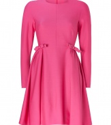 Fun in fuchsia with sweet side bows and a flattering fitted and flared silhouette, Valentinos long sleeve wool dress is a romantic way to wear the brands iconic look - Round neckline, long sleeves, hidden zippered cuffs, side bows, hidden back zip - Fitted bodice, full skirt - Wear with jet black minimalist accessories