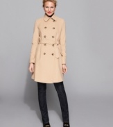 DKNY's petite classic trench keeps you warm all season. Layer over your winter-warmers for chic styling!