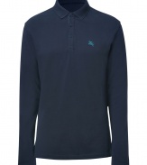 Build the foundations of your everyday staple separates wardrobe with Burberry Brits navy long sleeved cotton polo - Classic collar, partial buttoned front, embroidered logo, side slits, straight cut - Pair with favorite tweed blazers and chinos