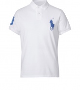 Detailed in breathable and durable cotton mesh, Ralph Laurens big pony polo is a cool modern take on this classic cut style - Small collar, button placket, short sleeves, oversized embroidered polo player at chest, number patch on sleeve, slit sides, high-low hemline - Classic fit - Wear with everything from jeans and sneakers to colored cords and loafers