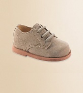 Dress uniform oxfords for the little man in classic dirty buck suede. Suede upper Topstitched details Spot clean Imported