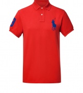 Detailed in breathable and durable cotton mesh, Ralph Laurens big pony polo is a cool modern take on this classic cut style - Small collar, button placket, short sleeves, oversized embroidered polo player at chest, number patch on sleeve, slit sides, high-low hemline - Classic fit - Wear with everything from jeans and sneakers to colored cords and loafers