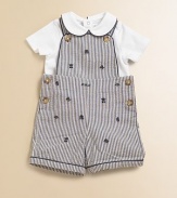 Preppy heritage style is adorably interpreted with an ultra-comfortable cotton jersey set that pairs a striped seersucker overall with a short-sleeved solid bodysuit. Overall Button-front shoulder strapsSleevelessSide buttons Bodysuit Peter Pan collarShort sleevesBack snapsBottom snapsCottonMachine washImported Please note: Number of buttons/snaps may vary depending on size ordered. Additional InformationKid's Apparel Size Guide 