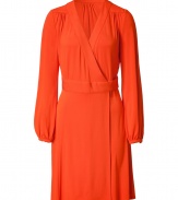 Stylish dress in fine, bright orange viscose stretch blend - Soft, ultra-flattering fabric drapes like a dream - Retro chic wrap style with deep v-neck and gently belled, long sleeves - Sash waist with two-button closure and decorative gather detail at shoulders - Slim skirt hits above knee - Elegant and polished, seamlessly transitions from work to cocktails - Pair with platform pumps or dressy sandals and a clutch or miniature shoulder bag