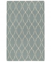 Stunning in its simplicity, this artist-designed area rug from Surya brings a calming beauty to any area in your home. Interlocking lines crisscross against a soft sky-blue background, creating a chic lattice-like pattern that's stylishly simple.