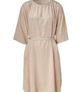 A relaxed 1970s silhouette gives this Schumacher dress a pared-down chic style - Rounded collar, pleating at neckline and back yoke, relaxed silhouette, detachable tie belt with chain detailing, asymmetrical curved hem - Style with platform sandals and an oversized satchel