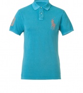 For a modern riff on a venerable classic, try Ralph Laurens big logo polo shirt - Soft yet durable turquoise pique cotton - Slim, straight cut - Small collar and short button placket - Oversize polo pony logo at chest and numbered sleeve - Hem hangs slightly longer in the back - Casually cool, ideal for everyday leisure - Pair with jeans, chinos or shorts