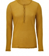 Raise the bar on contemporary classics with Steffen Schrauts dark yellow, cotton and cashmere blend henley - Modern slim cut is fitted throughout - Long sleeves and traditional crew neck with five-button placket - Decorative fraying at hem lends this shirt its casually cool, well-worn appeal - Layer with a cardigan or denim jacket and pair with jeans, chinos or cords