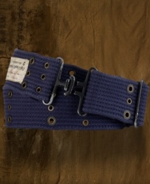 A once preppy essential gets a rugged update in this nautical-inspired belt, finished with metal grommets and timeworn metal hardware for an edgy twist.